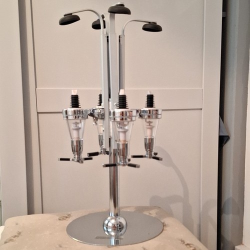 Rotating bottle stand drinks - rotating,