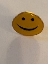 Yellow Smiley face metal badge