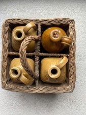 1880s Set Of 4 EMB Stoneware Whiskey Gin Brandy Jugs In Original Wicker Basket