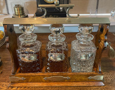 SUPURB CIRCA 1880s BETJEMANNS 3 DECANTER "THE TANTALUS" WITH SILVER LABELS