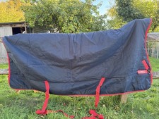 7ft Rambo Horseware Wug High Neck Heavyweight Stable Rug in black with red trim