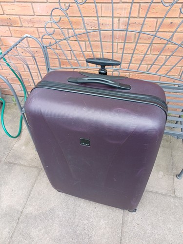 Large tripp suitcase available - large,