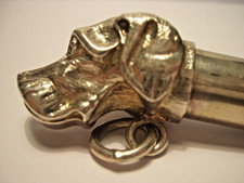 A VINTAGE WHITE METAL  " DOGS HEAD " WHISTLE . ( 9 )