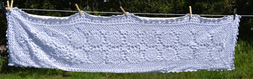 White cotton crocheted table