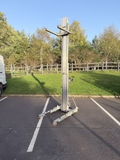 sumner 2010 material lift , material hoist , genie lift .