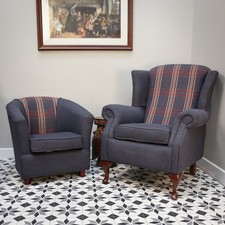 A Matching Tub and Wing Back Chair in Dark Blue and Tartan Fabric.