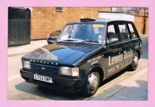 Taxi Photo - Lewis Taxis LT52OWP - 2002 Kamkorp Metrocab TTT - Coventry