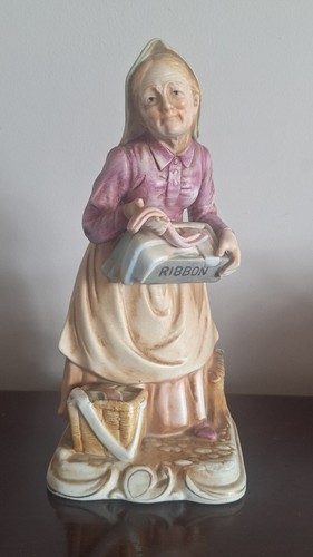Old lady with ribbon box - old,
