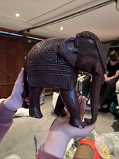 Hand carved wooden elephant - hand,