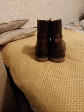 For sale brand new wrangler fur lined adult boots brown in colour mid calf high.