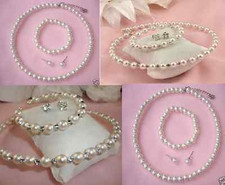 WHITE OR CREAM FAUX PEARL OR