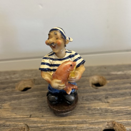 Pirate holding fish bottle - holding,