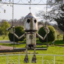 Metal Robot on a Swing -