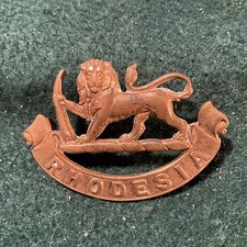 Southern Rhodesia Regiment Cap Badge gilded. Ae8