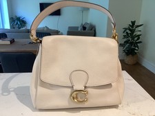 Coach large shoulder bag in crean & gold ...pre owned…dust bag too