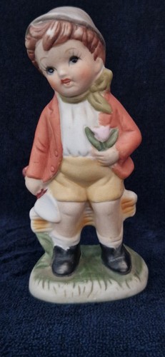 Porcelain boy with spade - with, and