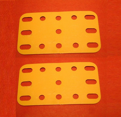 Two yellow meccano - two,