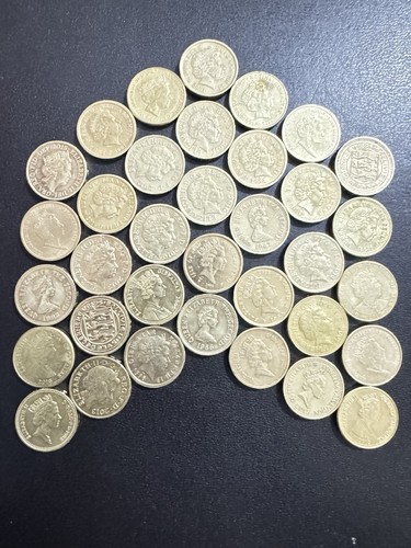 Old one pound coins - old,