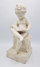 19TH CENTURY LARGE CONTINENTAL PARIAN PORCELAIN READING PUTTO FIGURE 13.5 INCHES
