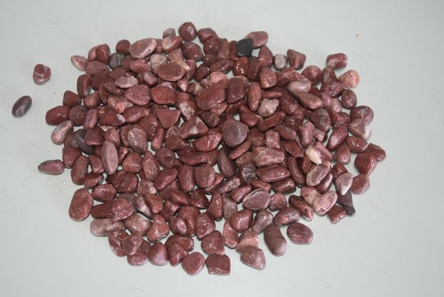 Natural red river pebbles - river,