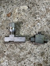 HYDRAULIC FLOW CONTROL VALVE AND TAP