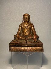 A antique bronze and gilt