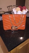 Womens clutch bag with chain by Tom&Eva