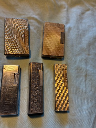 Old used cigarette lighters - used,