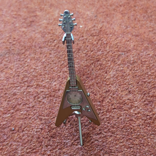 Guitar shaped novelty analogue - shaped,