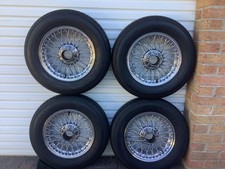 mgb chrome wire wheels 14x4.5J  with  four matching radial tires 165x80 