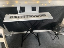 Yamaha Piaggero NP12 Piano Keyboard With Stand Chair White Table