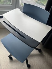 Integrated laptop desk chair on wheels with swivel seat and table. Workstation.