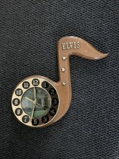 QUIRKY WOODEN MUSICAL NOTE SHAPED  ELVIS WALL CLOCK COLLECTORS PIECE 11.5” TALL