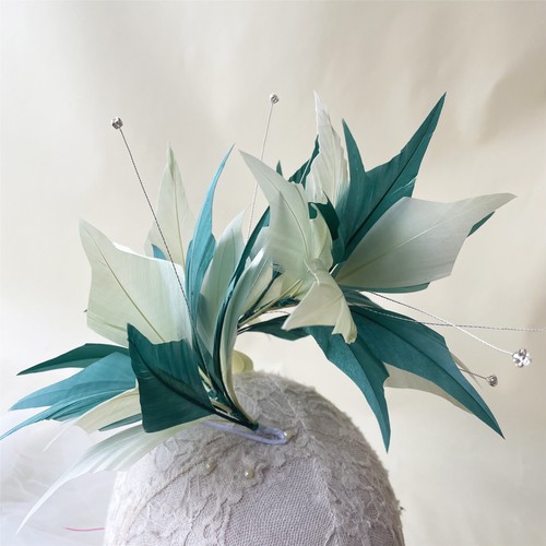 Goose feather twisted mount - feather,