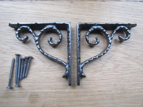 Pair textured scroll cast - scroll,