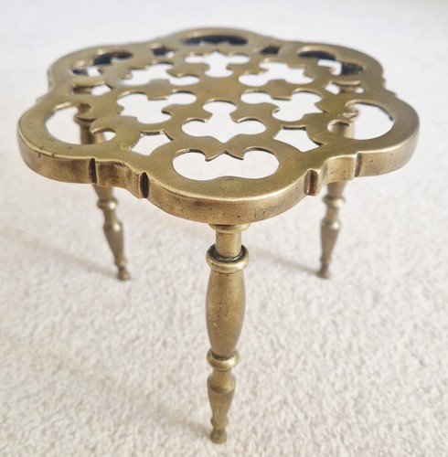 Vintage solid brass trivet - a,