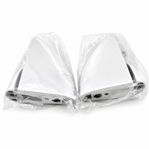 White ellipse brackets - white, wall
