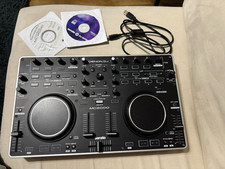 Denon DJ MC2000 Controller with padded flight bag and Serato discs