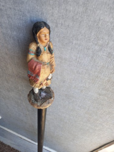 Carved resin handle squaw - handle, of