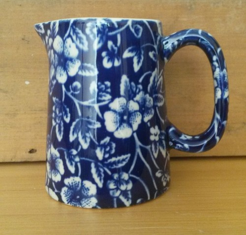 Blue white floral heron - &,