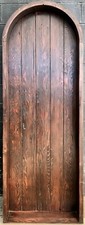 Rustic reclaimed lumber arched