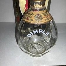 John Haig Dimple Scotch Whisky Bottle  Vintage, complete with mesh and cap