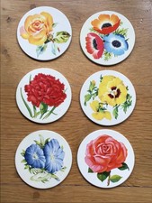Six 1970s floral metal & cork