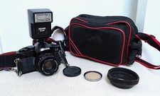 Vintage COSINA C1 35mm film SLR camera kit with lens and extras