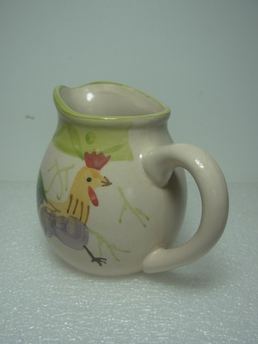 Pottery jug decorated with - pottery,