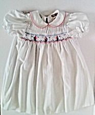 a Michael de leon  White Short Sleeved Dress with smocking  size: 1-2 years 1985