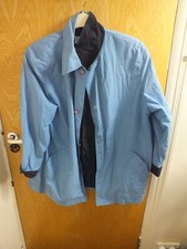 Cotswold Collections size 16 blue rain coat with pockets and snap fastening