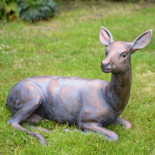 Bronze laying doe sculpture - doe,