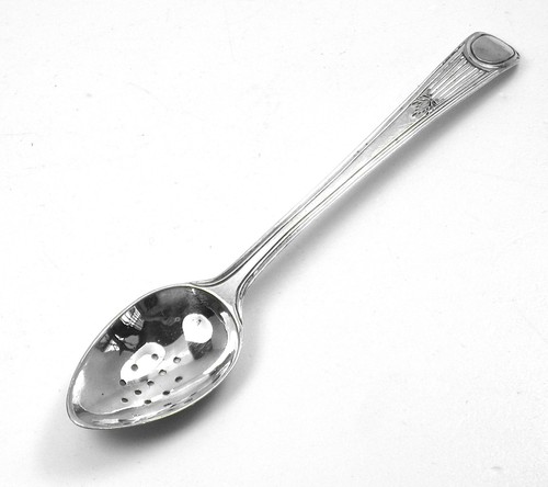 Spoon solid silver with holes