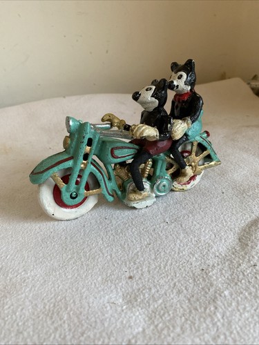 Vintage cast iron micky - cast,